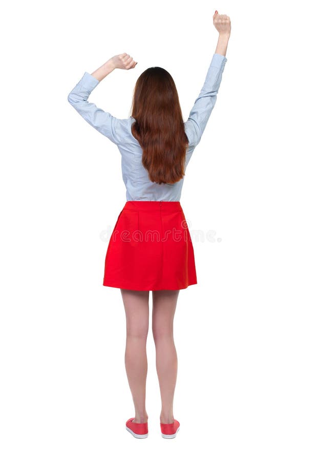 Back view of dancing young beautiful woman.