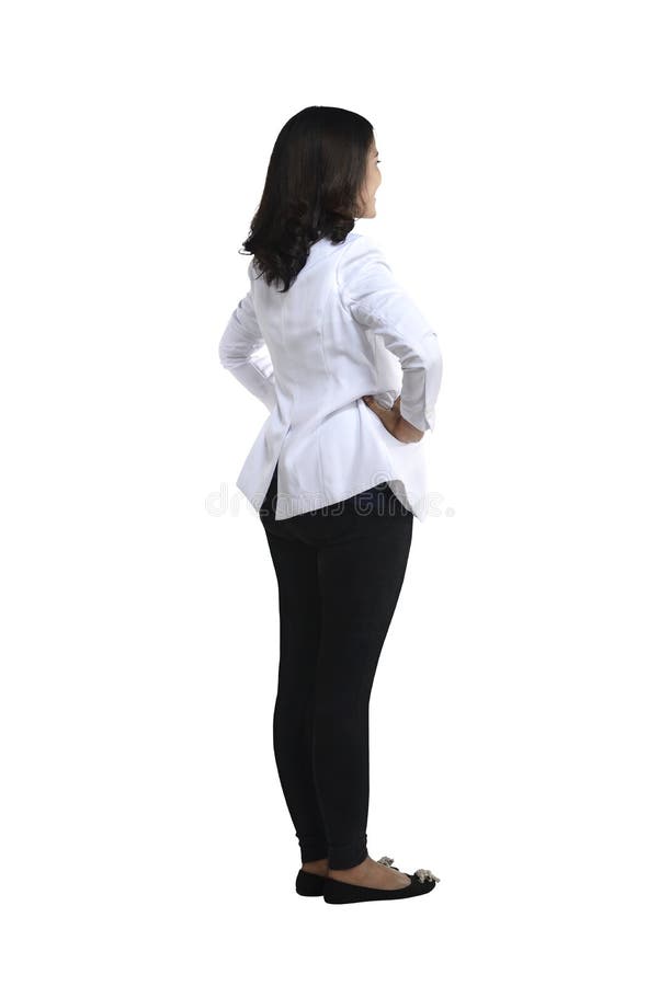 Back view of a female doctor looking at white