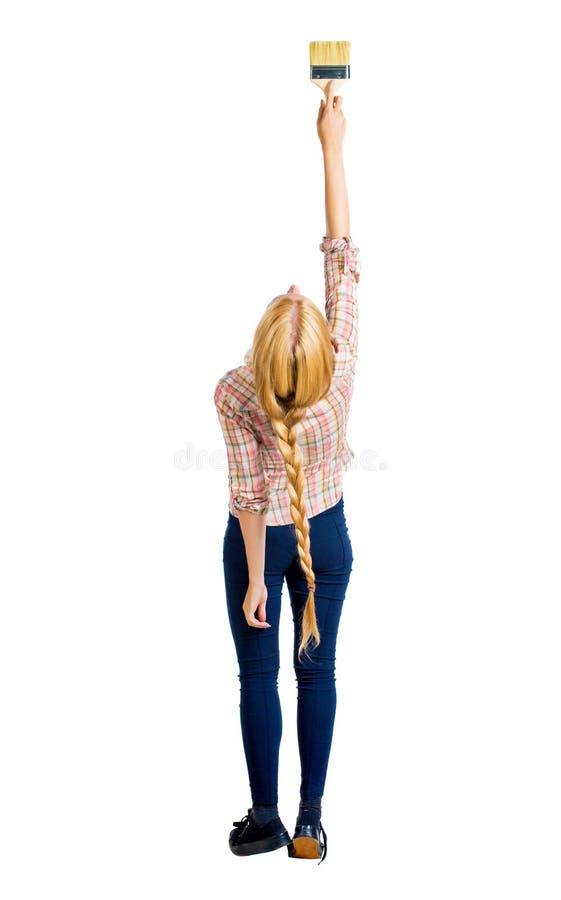 Back view of a girl who paints the paint roller. rear view people collection. backside view of person. Isolated over white background. Blonde with a scythe keeps high in his hand brush.