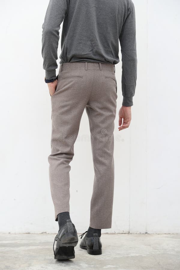 Back View of a Handsome Man in Gray Turtleneck Shirt and Long Trousers ...