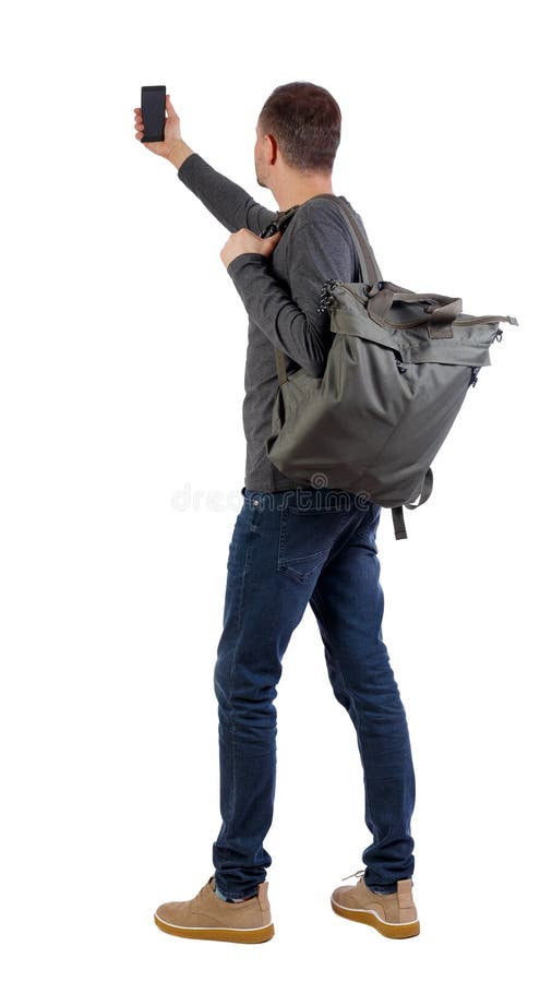 Back View of Man with Bag Who Makes Selfie with a Smartphone Stock ...