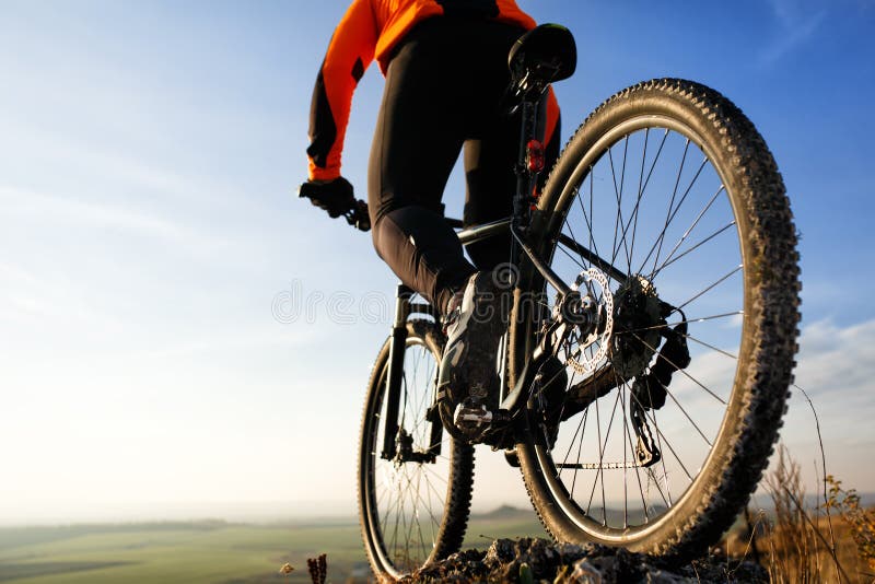 back view of a man with bicycle against the sky royalty free stock images back view of a man with bicycle against the sky royalty free stock images