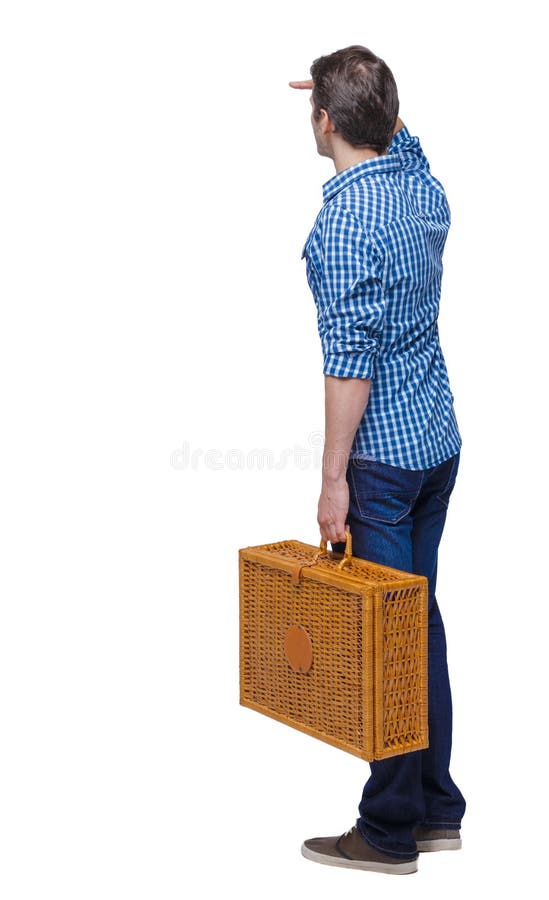 Back view of a man walking with a picnic bag stock photo Back view of a man walking with a picnic bag stock photo