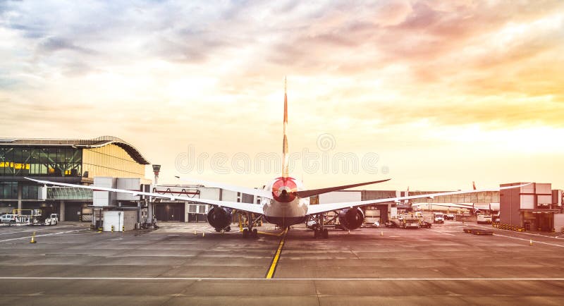 Back view of modern airplane at terminal gate ready for takeoff stock images Back view of modern airplane at terminal gate ready for takeoff stock images