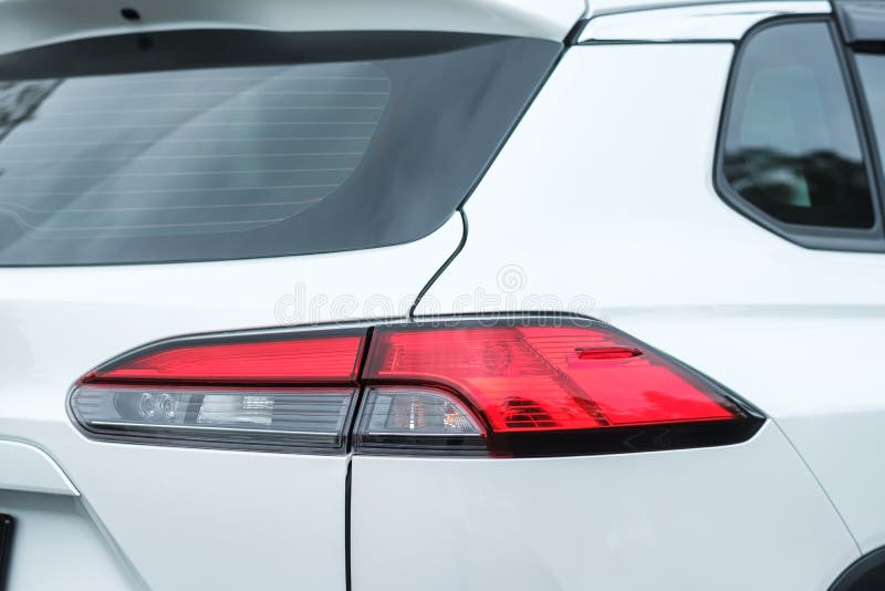 Back view part of white car with light royalty free stock photo