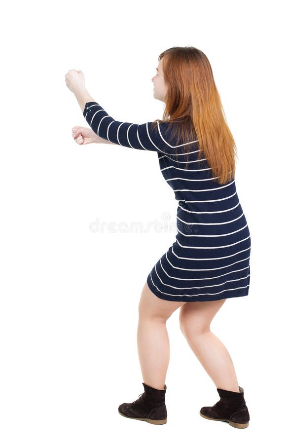 Back View of Standing Girl Pulling a Rope from the Top or Cling Stock