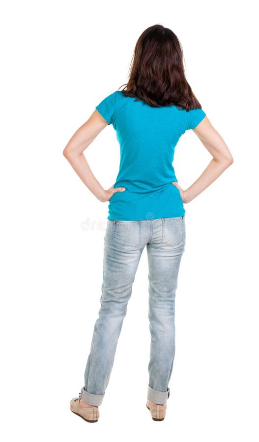 Back View Of Standing Young Beautiful Brunette Woman In Jeans Stock