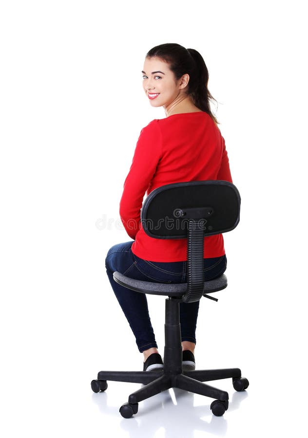 Back view student woman siting on armchair royalty free stock image