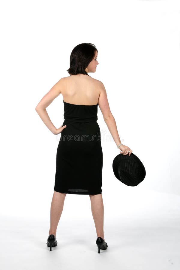 Back view of teenage girl in black dress