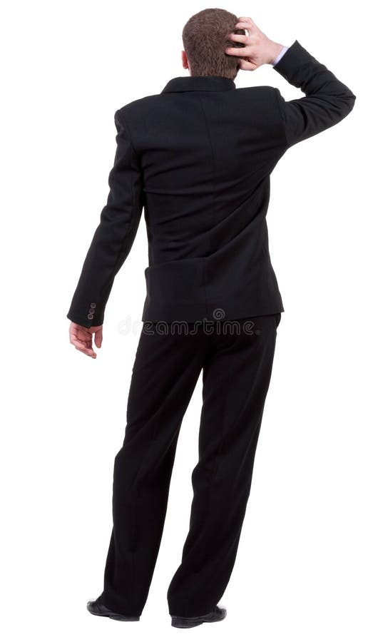 Back view of thinking business man. gesticulating adult businessman in black suit . Rear view people collection. backside view of person. Isolated over white background. Businessman in a stylish black suit thoughtfully scratching his head looking at what is in front of him.