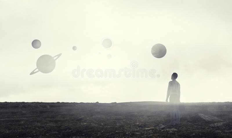 Back view of young businessman while standing with mist background royalty free stock photo