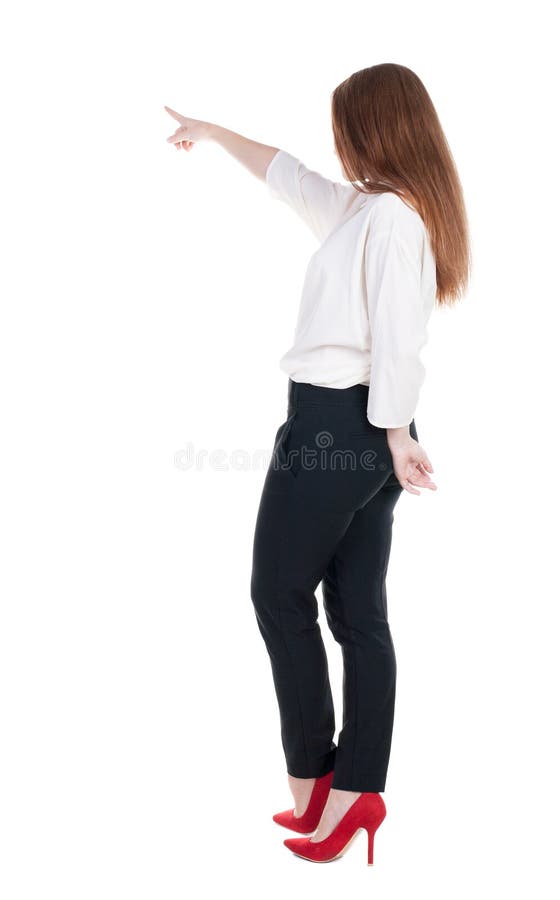 Back View of Young Redhead Business Woman Pointing at Wal Stock Photo ...