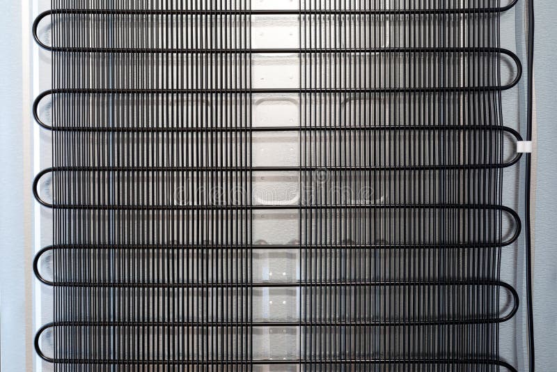 Back Wall of the Domestic Refrigerator with Grille Stock Photo Image