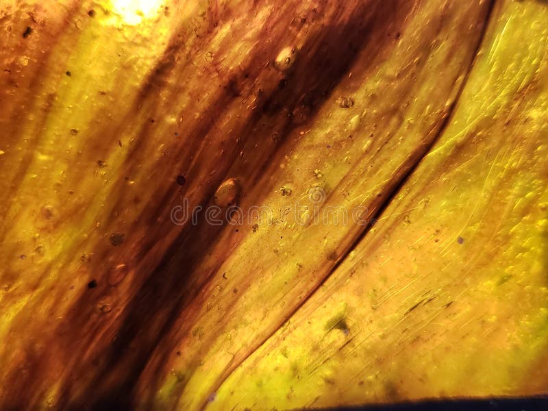 approach to yellow stained glass with brown, background and texture royalty free stock image approach to yellow stained glass with brown, background and texture royalty free stock image