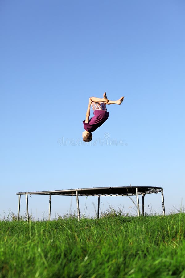 Trampoline backflip stock image. Image of athletic, beauty 14260781