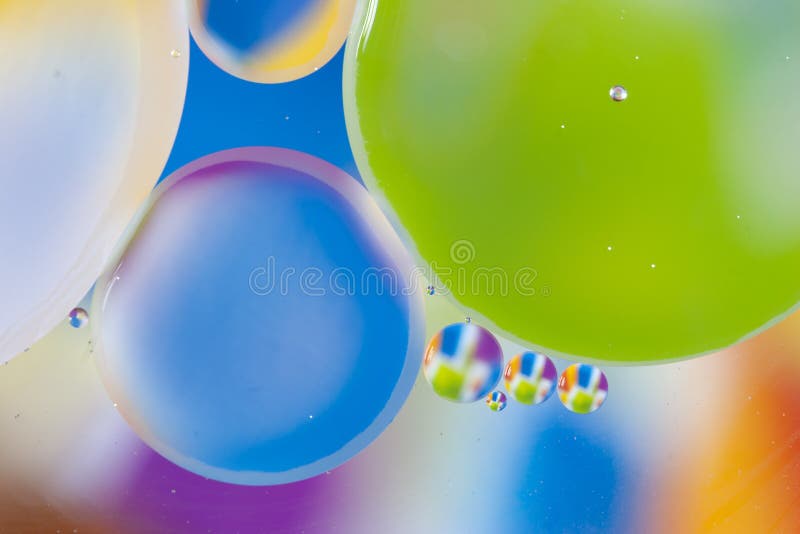 Backgroud de mezcla del agua y del aceite, abstracción macra imagen de archivo Backgroud de mezcla del agua y del aceite, abstracción macra imagen de archivo