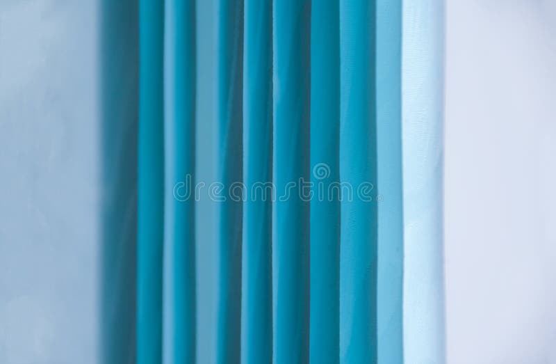 Background blue roll curtains on a white background
