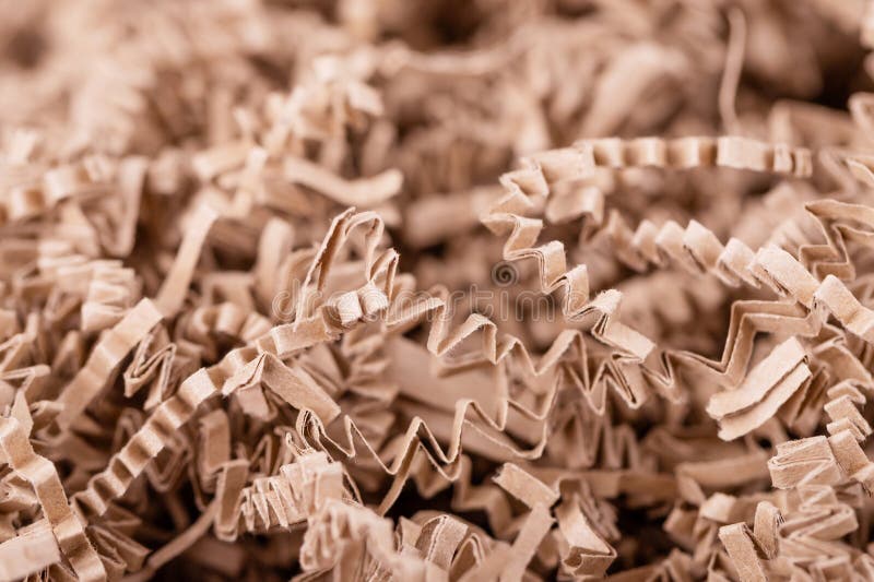 Background of Brown Shredded Paper. Strips of Sliced Corrugated Eco