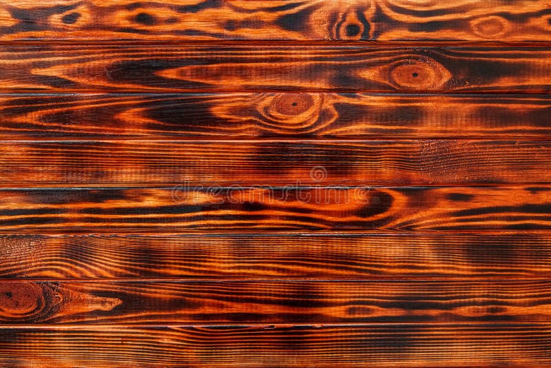 Burnt pine boards painted like mahogany royalty free stock photography