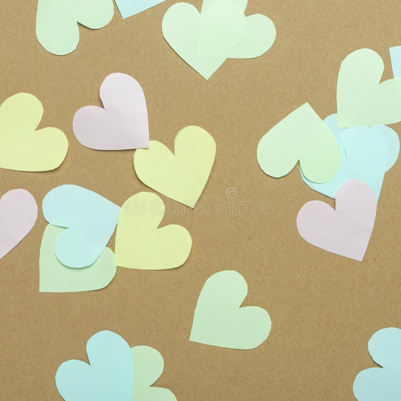 Background or Card with Paper Hearts of Different Color on Craft