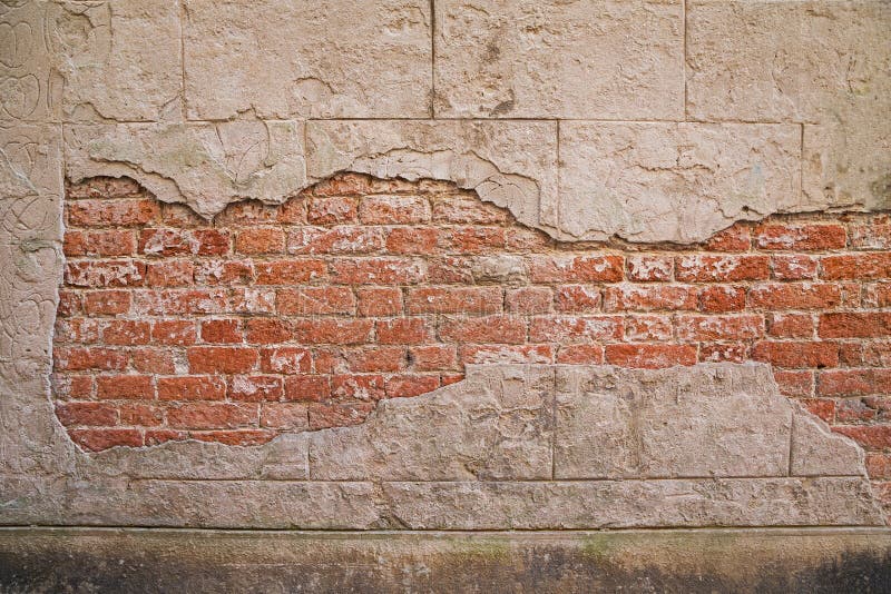 Background of crack color and cement concrete surface of antique abandoned house. can see texture of old red brick wall in side royalty free stock photo Background of crack color and cement concrete surface of antique abandoned house. can see texture of old red brick wall in side royalty free stock photo