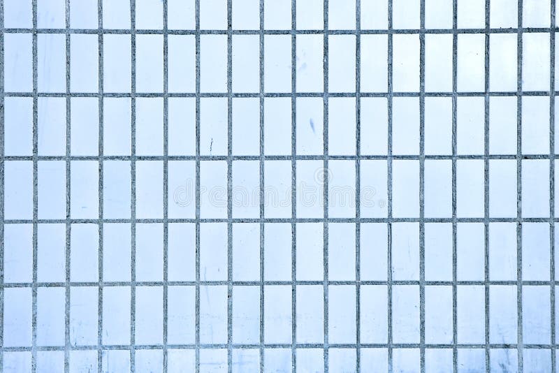 Background from dirty blue rectangular ceramic tiles stock image