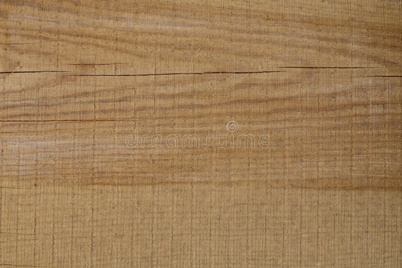 Background of freshly cut brown wooden boards with cracks stock images Background of freshly cut brown wooden boards with cracks stock images