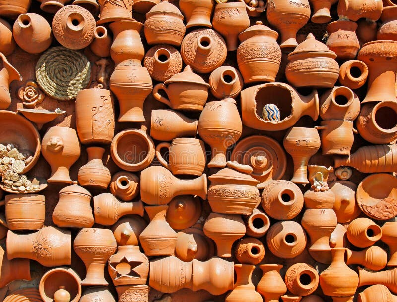 Background of Handmade Ceramic Clay Brown Terracotta Pots with Names