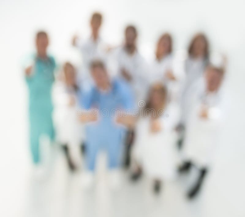 Background image of a group of doctors showing thumbs up. royalty free stock images