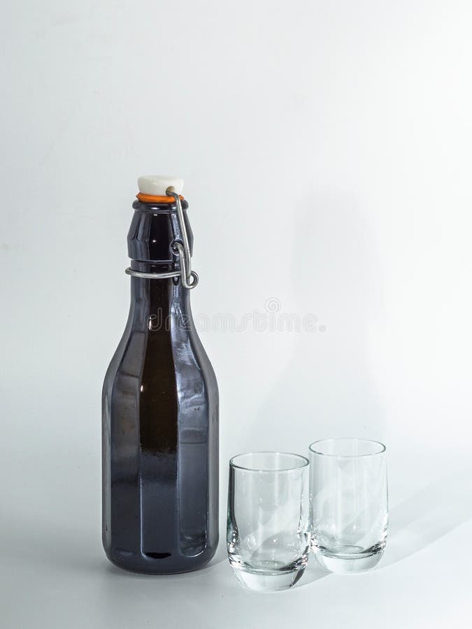 Background with Liquor Bottle and Shot Glasses Stock Image Image of