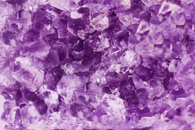 Background made of mineral. Lilac amethyst crystal surface