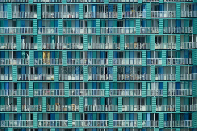 Background of a modern architecture texture of a skyscraper wall with balconies and windows stock photos Background of a modern architecture texture of a skyscraper wall with balconies and windows stock photos