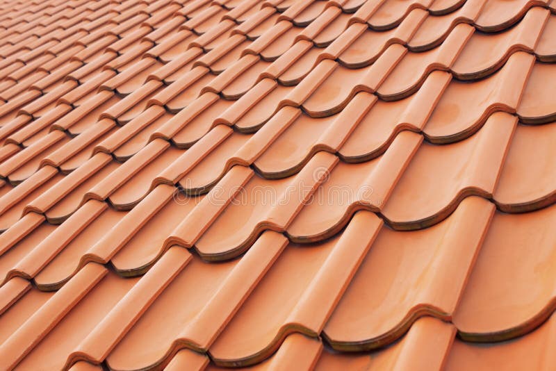 Background perspective of red roof tiles