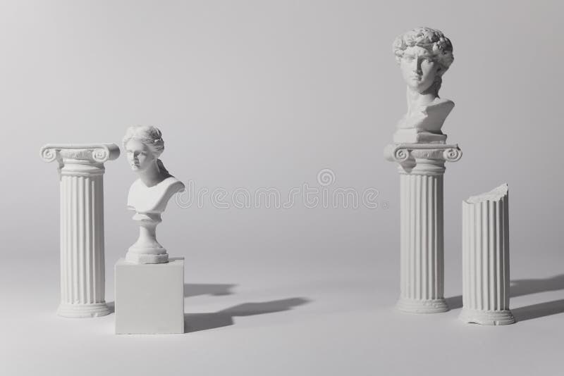 Background for product presentation. Antique columns ans statues on white background