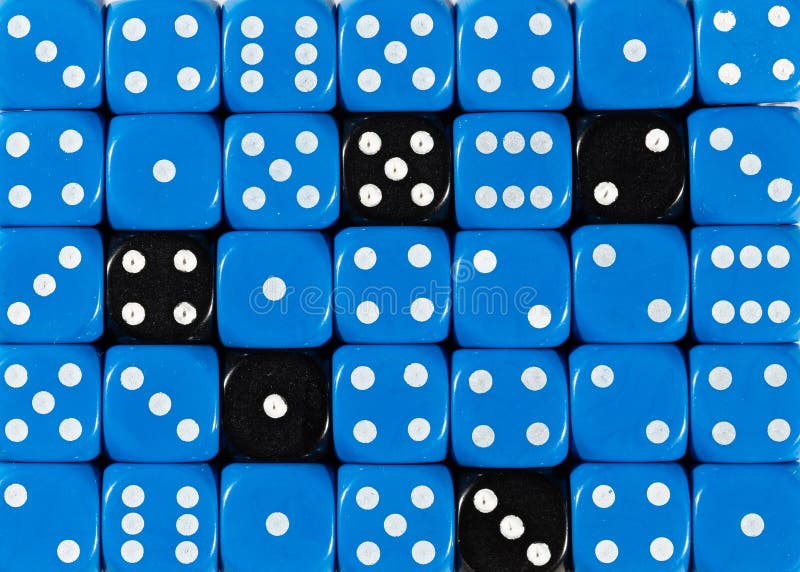 Background of random ordered blue dices with five black cubes stock photo