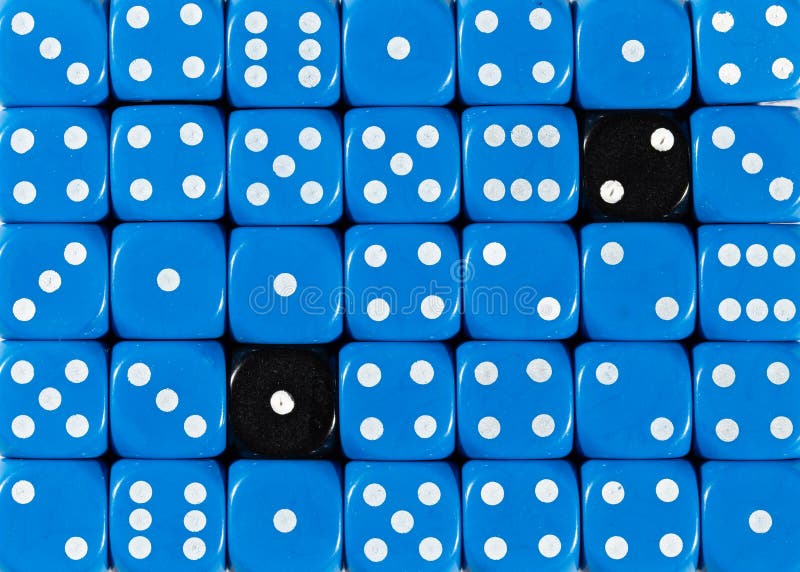Background of random ordered blue dices with two black cubes stock photos