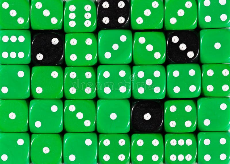 Background of random ordered green dices with four black cubes stock photos