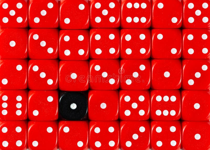 Background of random ordered red dices with one black cube stock image