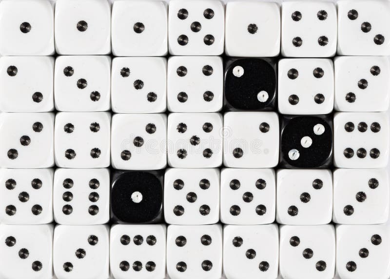 Background of random ordered white dices with three black cubes stock image