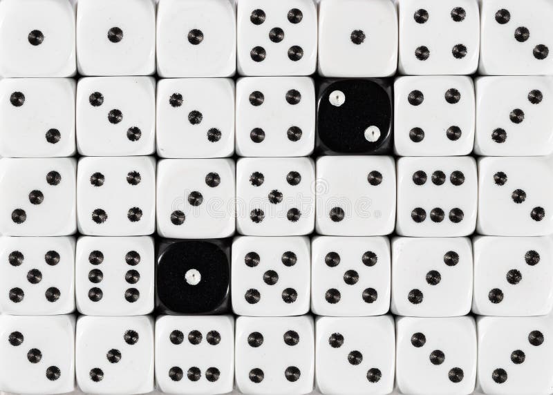 Background of random ordered white dices with two black cubes royalty free stock image