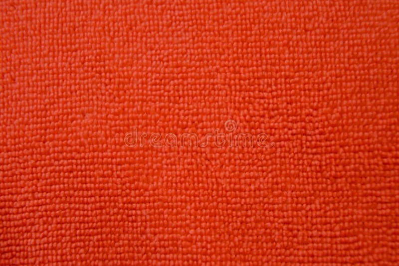 Background of Red Microfiber Cloth. Texture Fabric for Cleaning Stock