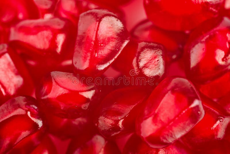 Background of ripe grains pomegranate