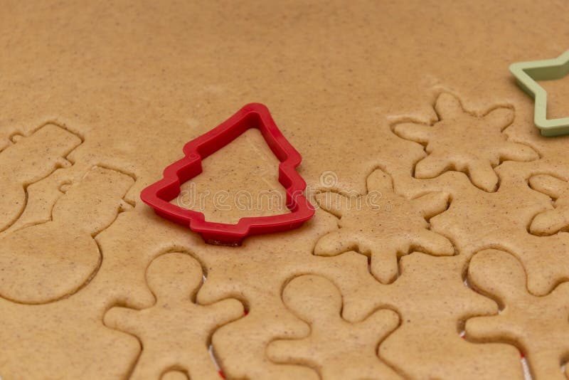 Background Rolls Out the Dough with Cookie Cutters at the Kitchen Stock