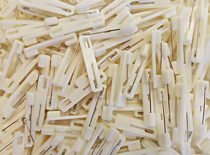 Bunch Of Wire Safety Pins With A White Plastic Base Stock Photo Image