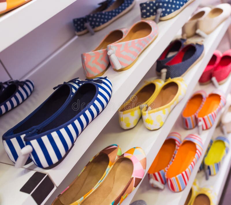 Background with Shoes on Shelves of Shop Stock Photo - Image of ...