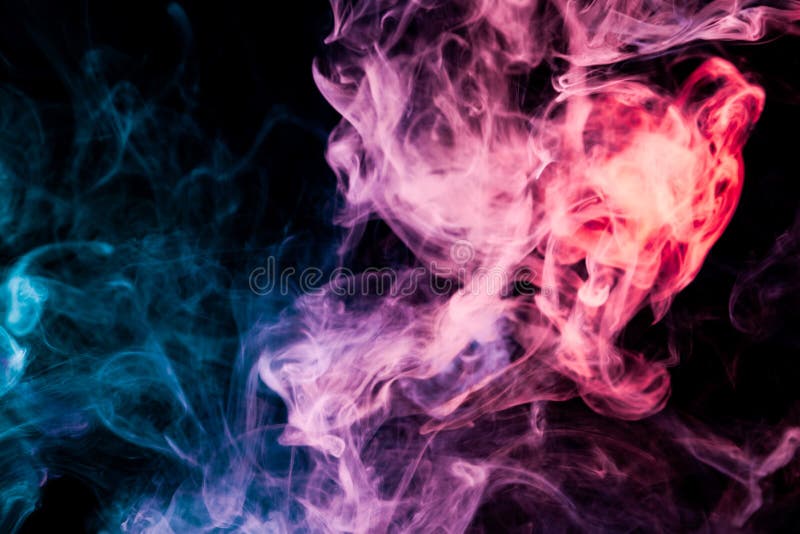 Cloud of pink,purple and blue smoke on a black isolated background. Background from the smoke of vape