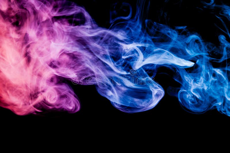 Colorful blue, green and pink smoke on a black isolated background. Background from the smoke of vape. Colorful blue, green and pink smoke on a black isolated background. Background from the smoke of vape