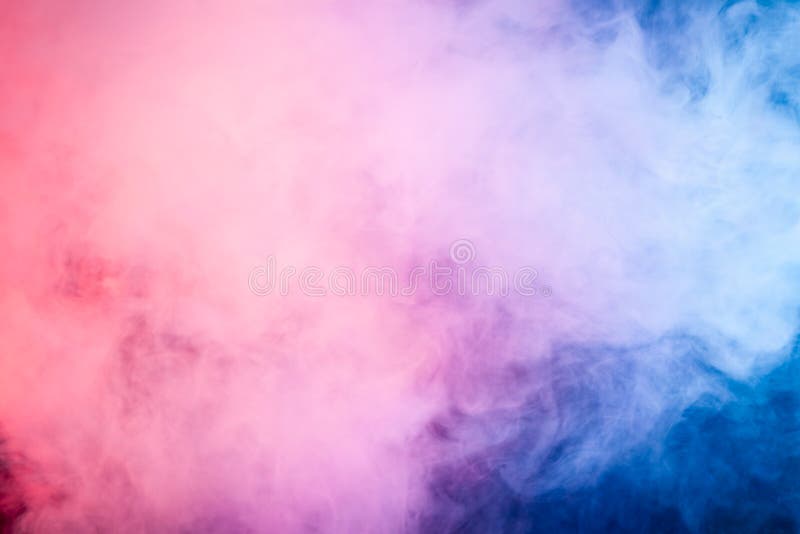 Thick colorful pink and blue smoke on a black isolated background. Background from the smoke of vape