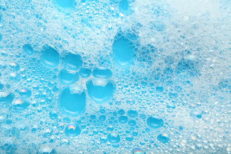 Background soap suds foam and bubbles from detergent. House cleaning concept