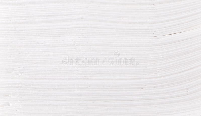Background of Stack of folded disposable paper tissues. stock photo
